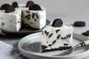 A bowl of Homemade Oreo Ice Cream, featuring creamy ice cream mixed with chunks of Oreo cookies.