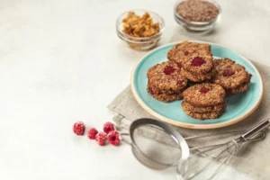 Homemade gluten-free energy balls on a wooden surface.