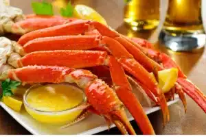 Cooked snow crab legs with garlic butter