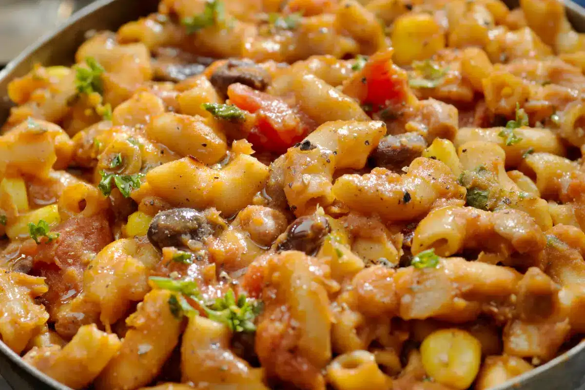  Bowl of homemade beefaroni with Parmesan and herbs.