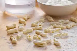 Homemade cavatelli pasta on a kitchen surface